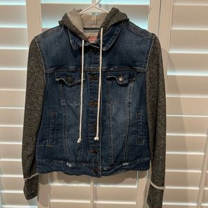 Blue Jean jacket with a hood.